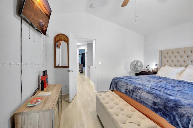 5565 SW 43rd St, Davie, FL 33314 - bedroom with light wood-style flooring, lofted ceiling, ceiling fan, and baseboards
