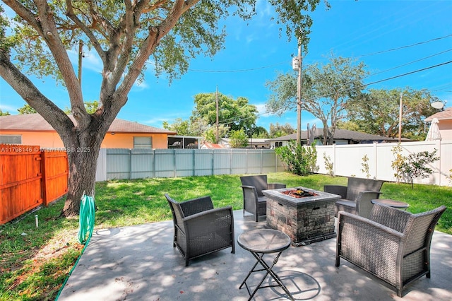 5565 SW 43rd St, Davie, FL 33314 - fenced backyard featuring an outdoor fire pit and a patio