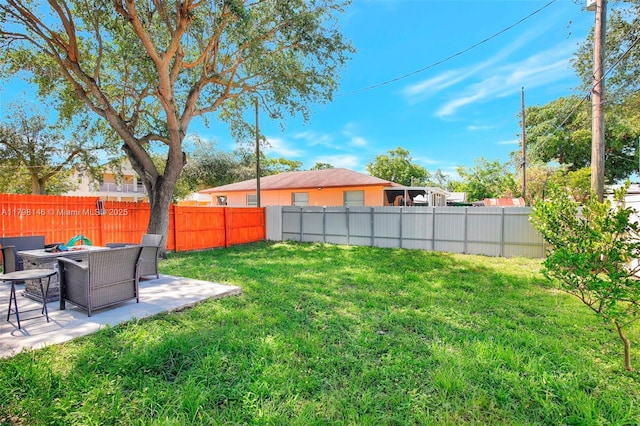 5565 SW 43rd St, Davie, FL 33314 - view of yard featuring a patio and a fire pit