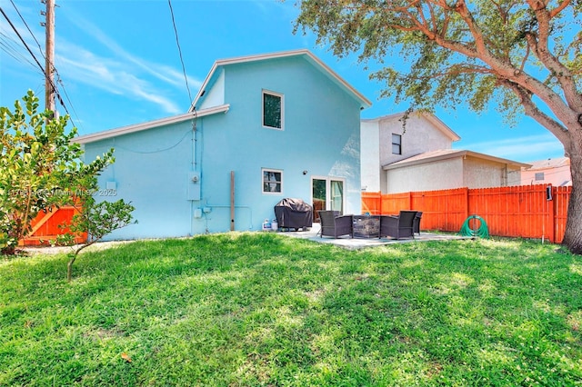 5565 SW 43rd St, Davie, FL 33314 - rear view of house with an outdoor living space, stucco siding, and a patio