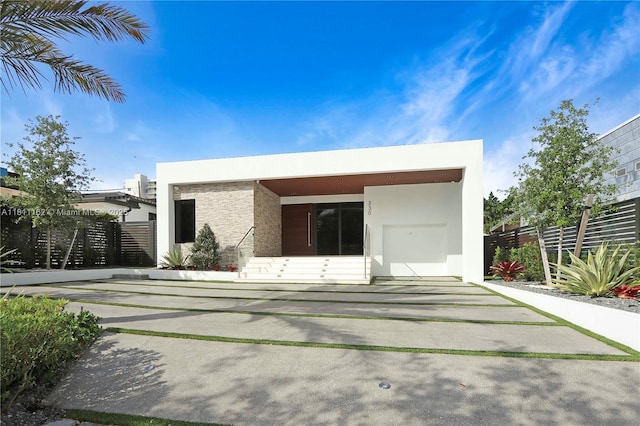 330 SW 19th Rd, Miami, FL 33129 - back of house featuring stucco siding
