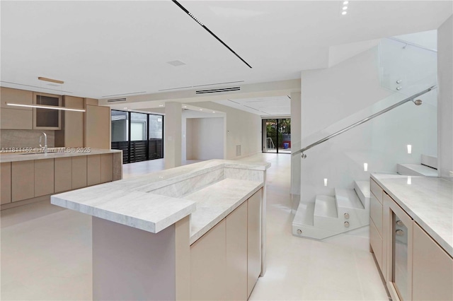 330 SW 19th Rd, Miami, FL 33129 - kitchen with modern cabinets, light countertops, and a kitchen island
