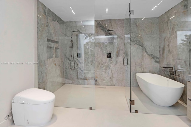 330 SW 19th Rd, Miami, FL 33129 - bathroom with a marble finish shower, tile walls, and a soaking tub