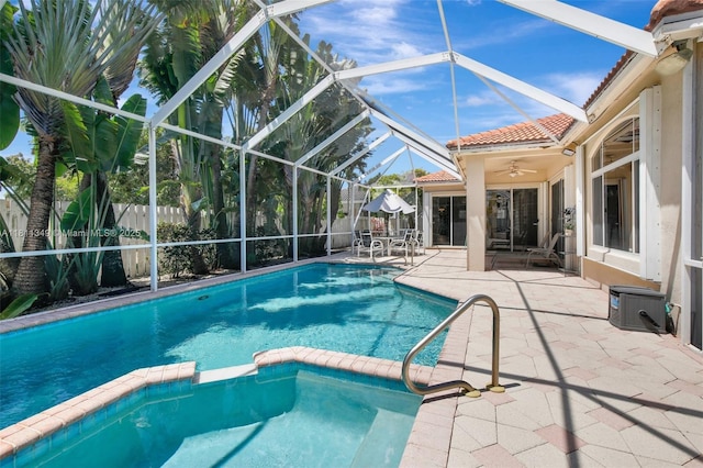 13220 NW 11th Ct, Sunrise, FL 33323 - view of pool with a patio area, a pool with connected hot tub, a ceiling fan, and a lanai