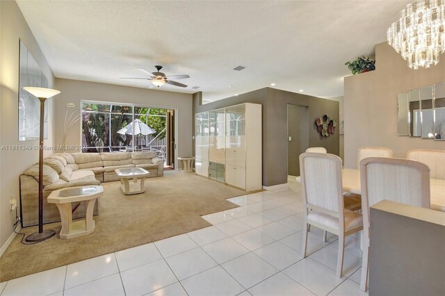 13220 NW 11th Ct, Sunrise, FL 33323 - living room featuring light carpet, ceiling fan, light tile patterned floors, and recessed lighting