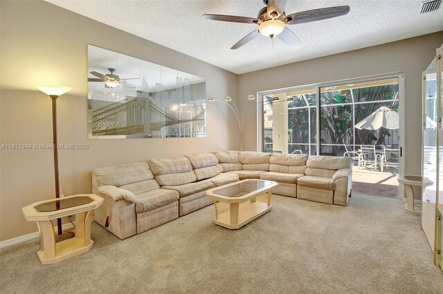 13220 NW 11th Ct, Sunrise, FL 33323 - carpeted living area with ceiling fan and a textured ceiling