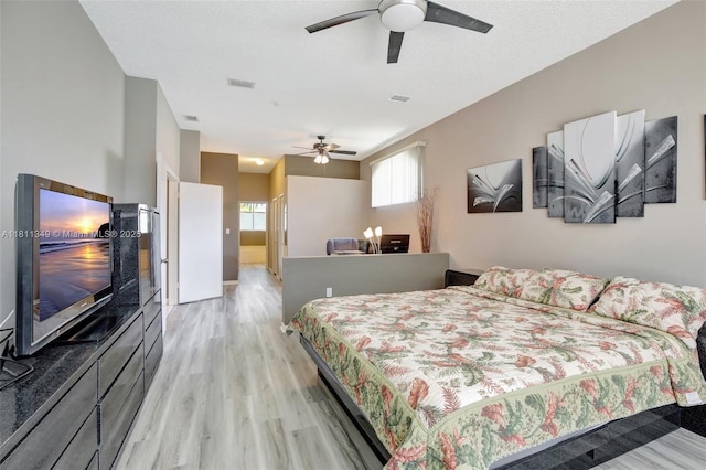 13220 NW 11th Ct, Sunrise, FL 33323 - bedroom featuring light wood-style flooring and a ceiling fan