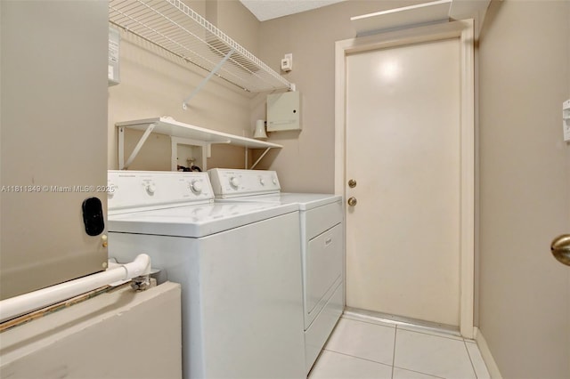 13220 NW 11th Ct, Sunrise, FL 33323 - laundry area with washer and dryer and light tile patterned floors
