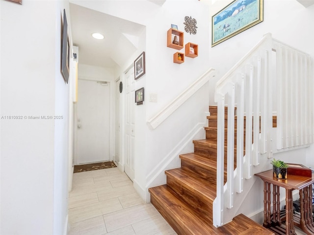 1030 Bamboo Ln, Weston, FL 33327 - staircase with tile patterned floors, recessed lighting, and baseboards