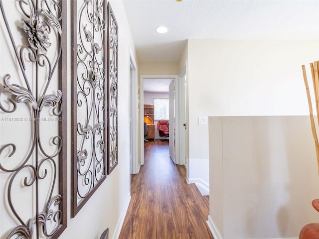 1030 Bamboo Ln, Weston, FL 33327 - hall featuring wood finished floors, baseboards, a textured ceiling, and recessed lighting