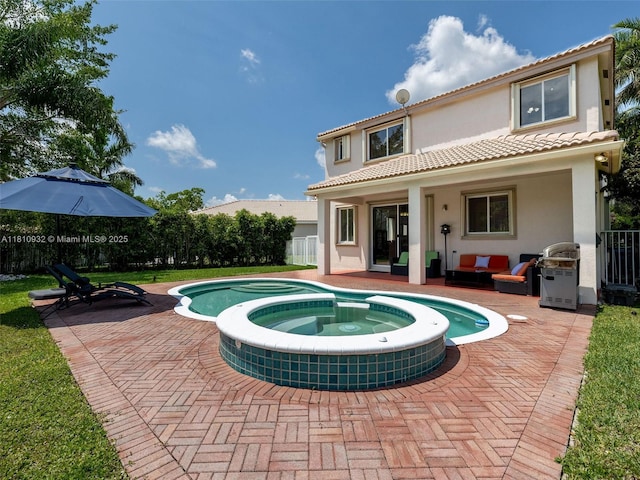 1030 Bamboo Ln, Weston, FL 33327 - rear view of property featuring a patio, stucco siding, a pool with connected hot tub, and a tile roof