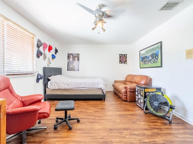 1030 Bamboo Ln, Weston, FL 33327 - bedroom with wood finished floors, baseboards, and ceiling fan