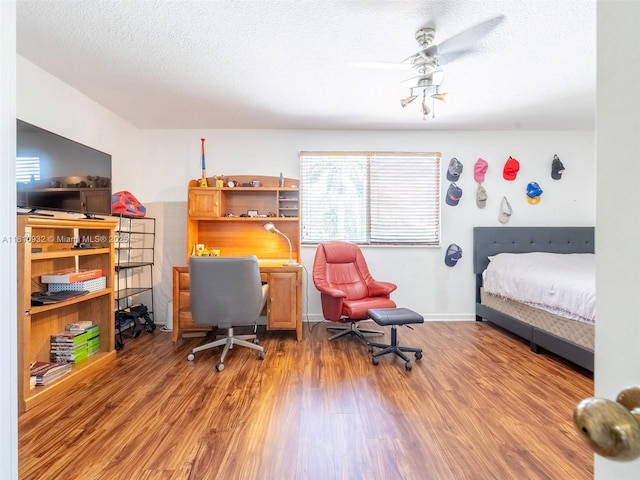 1030 Bamboo Ln, Weston, FL 33327 - bedroom featuring wood finished floors and a textured ceiling