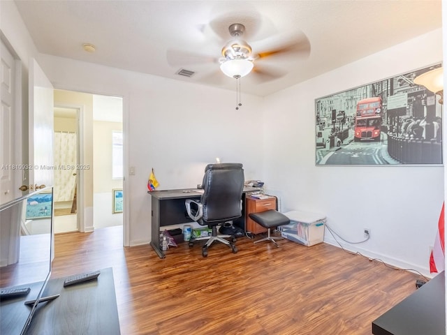 1030 Bamboo Ln, Weston, FL 33327 - home office featuring wood finished floors, ceiling fan, and baseboards