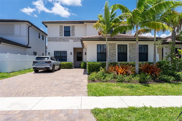 4366 SW 174th Ave, Miramar, FL 33029 - view of front of property with decorative driveway, stone siding, stucco siding, and a tile roof