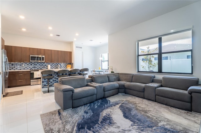 4366 SW 174th Ave, Miramar, FL 33029 - living area featuring light tile patterned floors and recessed lighting