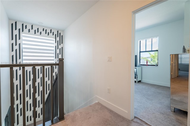 4366 SW 174th Ave, Miramar, FL 33029 - hall featuring carpet floors, baseboards, and an upstairs landing