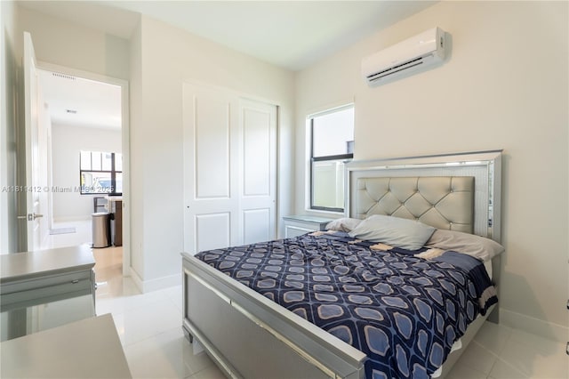 4366 SW 174th Ave, Miramar, FL 33029 - bedroom featuring an AC wall unit, multiple windows, a closet, and baseboards