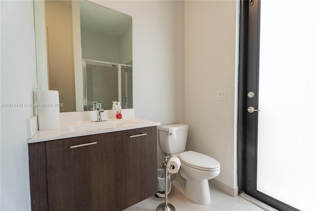 4366 SW 174th Ave, Miramar, FL 33029 - full bath featuring toilet, vanity, tile patterned floors, and an enclosed shower
