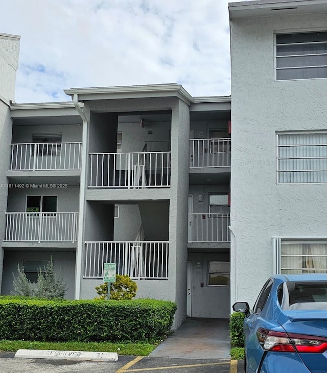 8475 SW 156th Ct Unit 321, Miami, FL 33193 - view of apartment building / complex with uncovered parking