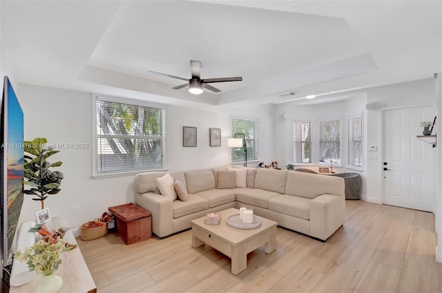 4413 NW 97th Pl, Doral, FL 33178 - living area featuring a raised ceiling and plenty of natural light