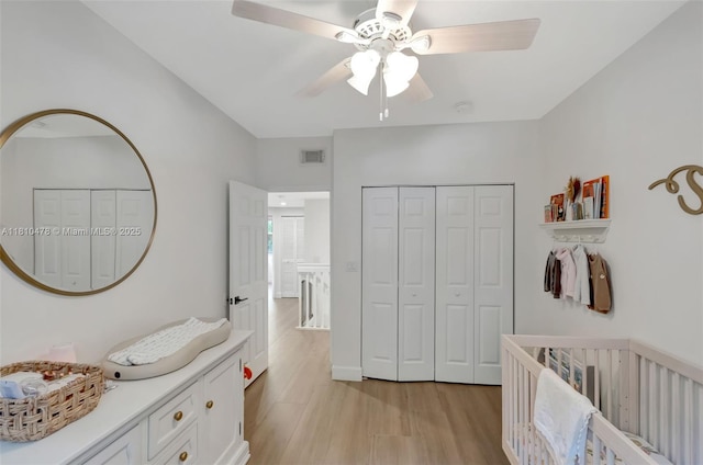 4413 NW 97th Pl, Doral, FL 33178 - bedroom featuring light wood-style floors, ceiling fan, and a closet