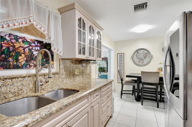 4035 N 110th Ave N, West Palm Beach, FL 33411 - kitchen featuring smart refrigerator, a sink, light tile patterned flooring, glass insert cabinets, and backsplash