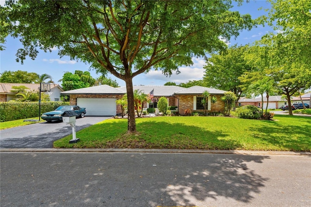 988 NW 110th Ave, Coral Springs, FL 33071 - single story home featuring asphalt driveway and a front yard