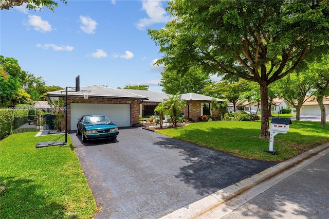 988 NW 110th Ave, Coral Springs, FL 33071 - single story home featuring asphalt driveway and an attached garage