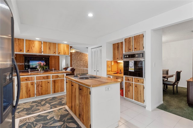 988 NW 110th Ave, Coral Springs, FL 33071 - kitchen featuring stainless steel appliances, light countertops, a kitchen island, backsplash, and recessed lighting