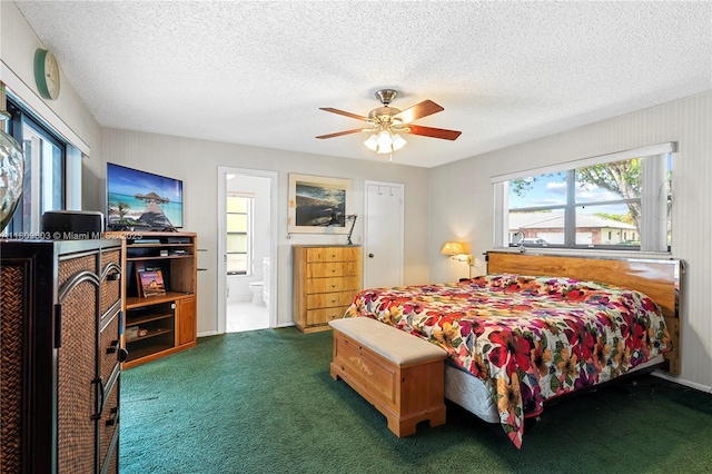 988 NW 110th Ave, Coral Springs, FL 33071 - bedroom featuring carpet, a textured ceiling, a ceiling fan, and ensuite bathroom