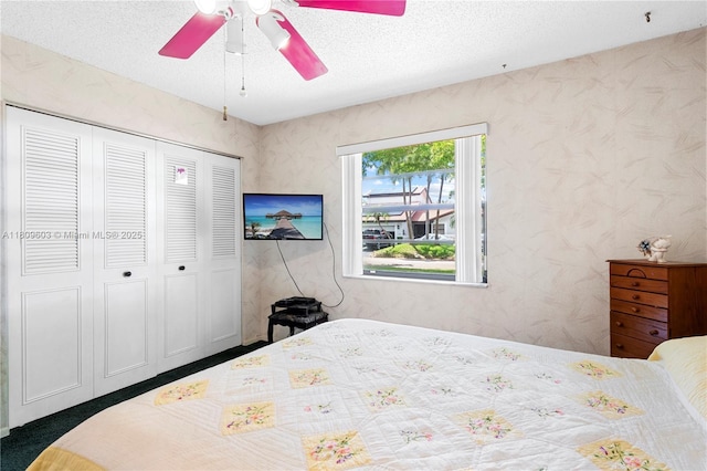 988 NW 110th Ave, Coral Springs, FL 33071 - bedroom with a closet, a textured ceiling, and ceiling fan