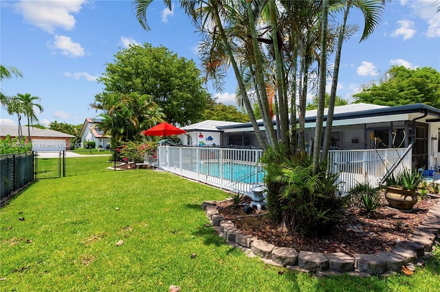 988 NW 110th Ave, Coral Springs, FL 33071 - view of yard featuring a sunroom and a gate