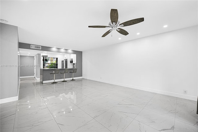 132 S Cypress Rd Unit 518, Pompano Beach, FL 33060 - unfurnished living room featuring marble look tiles, a ceiling fan, and recessed lighting