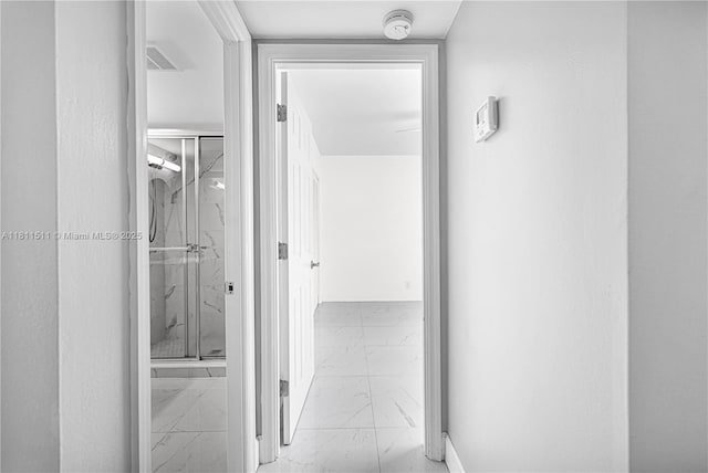 132 S Cypress Rd Unit 518, Pompano Beach, FL 33060 - hall featuring marble finish flooring and baseboards