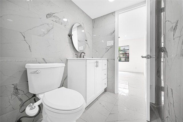 132 S Cypress Rd Unit 518, Pompano Beach, FL 33060 - bathroom with marble tiled floors, vanity, tile walls, and stone wall
