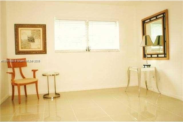 2431 SW 82nd Ave Unit 205, Davie, FL 33324 - unfurnished room with baseboards and tile patterned floors