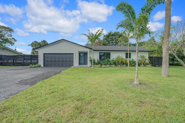 4220 SW 4th St, Plantation, FL 33317 - ranch-style house featuring driveway, a garage, and stucco siding