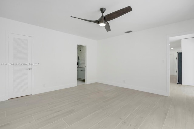 4220 SW 4th St, Plantation, FL 33317 - empty room with a ceiling fan, light wood-type flooring, and baseboards