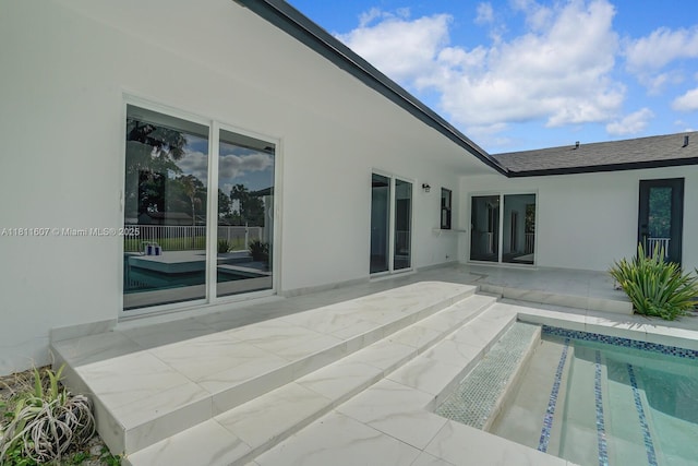 4220 SW 4th St, Plantation, FL 33317 - rear view of property with a patio, stucco siding, and an outdoor pool