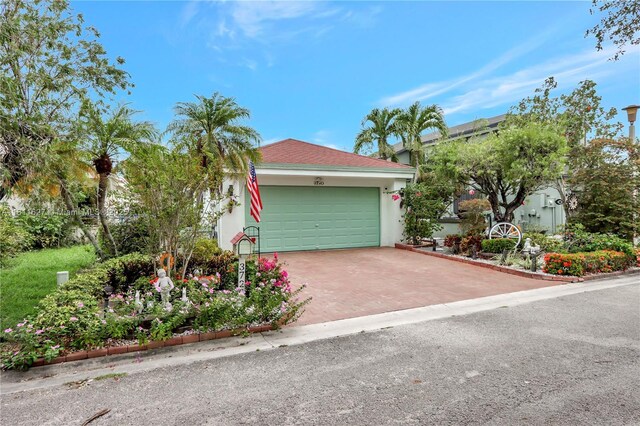3720 NW 20th St, Coconut Creek, FL 33066 - garage featuring decorative driveway