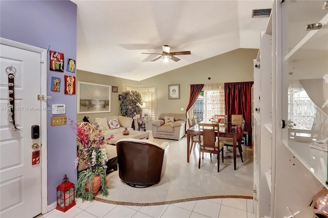 3720 NW 20th St, Coconut Creek, FL 33066 - tiled living area with ceiling fan, lofted ceiling, and baseboards