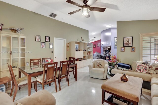 3720 NW 20th St, Coconut Creek, FL 33066 - living area featuring vaulted ceiling, ceiling fan, and light tile patterned floors