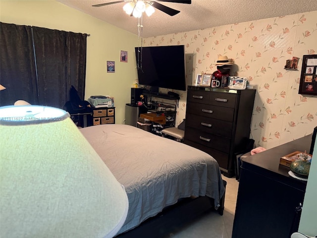3720 NW 20th St, Coconut Creek, FL 33066 - bedroom with a textured ceiling, light tile patterned flooring, wallpapered walls, and a ceiling fan