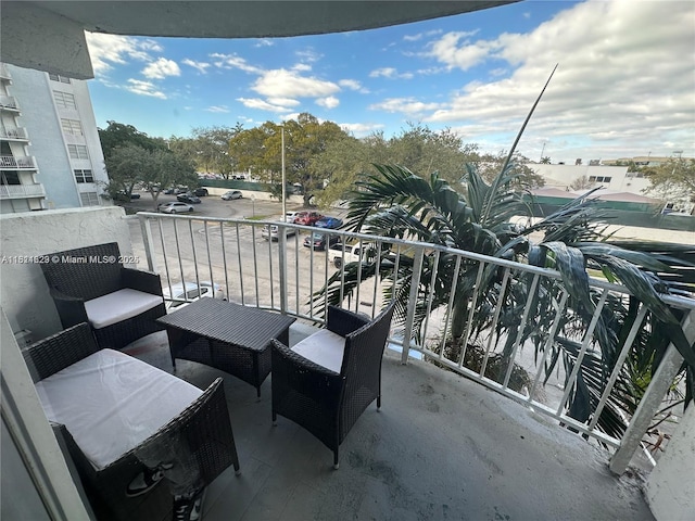 486 NW 165th St Rd Unit B-303, Miami, FL 33169 - balcony featuring outdoor lounge area