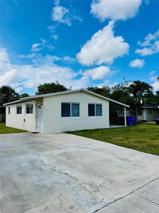 4341 NW 59th St, North Lauderdale, FL 33319 - single story home with stucco siding, a front yard, and driveway