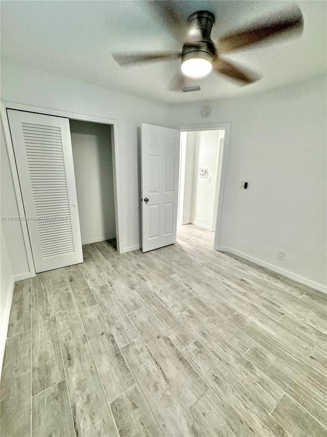 4341 NW 59th St, North Lauderdale, FL 33319 - unfurnished bedroom with light wood-style flooring, a closet, and ceiling fan