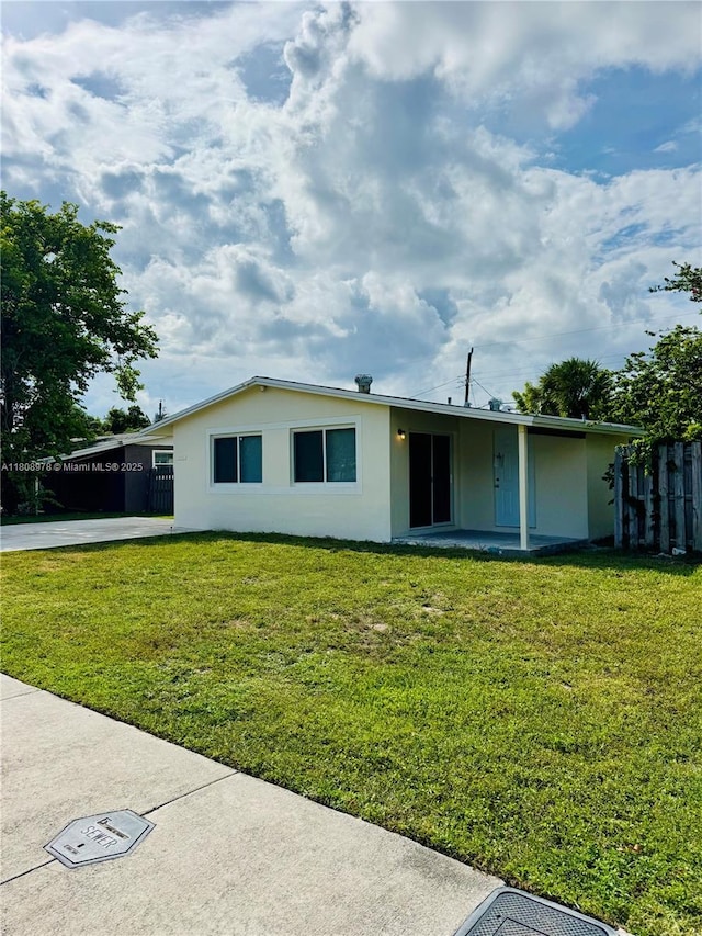 4341 NW 59th St, North Lauderdale, FL 33319 - back of property with stucco siding