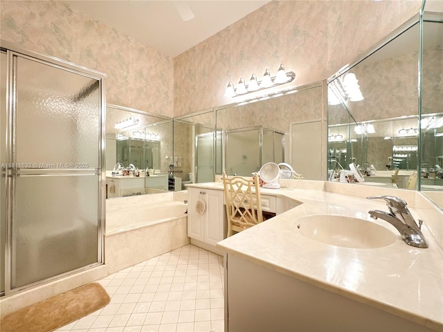 5154 Floria Dr Unit O, Boynton Beach, FL 33437 - bathroom with a garden tub, vanity, tile patterned floors, a shower stall, and wallpapered walls
