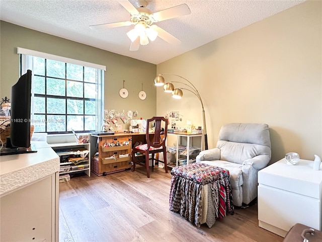 5154 Floria Dr Unit O, Boynton Beach, FL 33437 - office space with light wood finished floors, a textured ceiling, and ceiling fan
